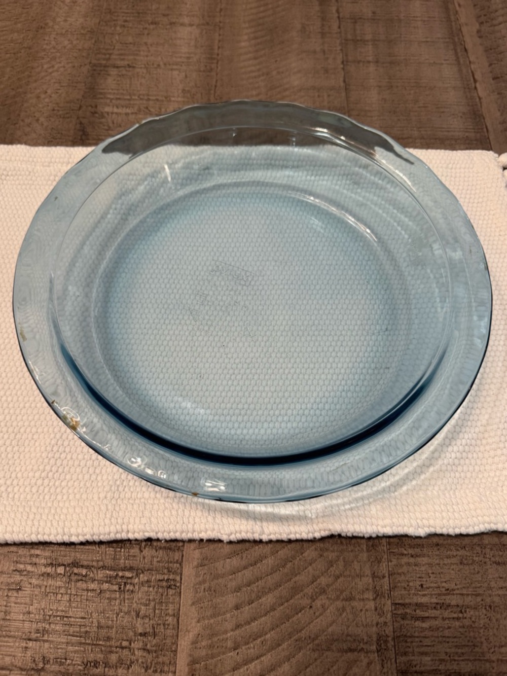 Pyrex glass pie plate. Light blue. Used a couple times.